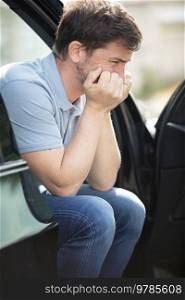 profile view of a young man feeling stressed