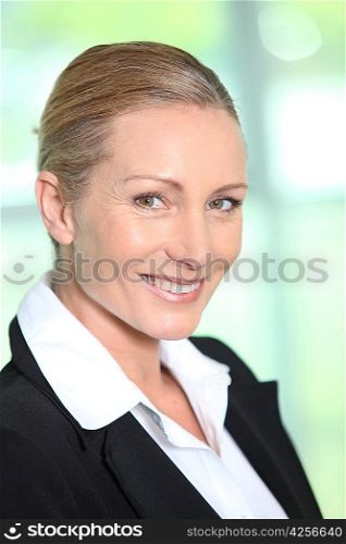 Profile view of blond businesswoman