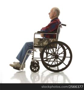 Profile view of Caucasion elderly man sitting in wheelchair.