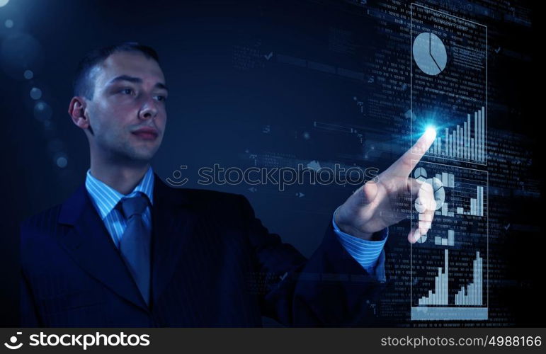 Profit chart. Young businessman pressing icon of media screen