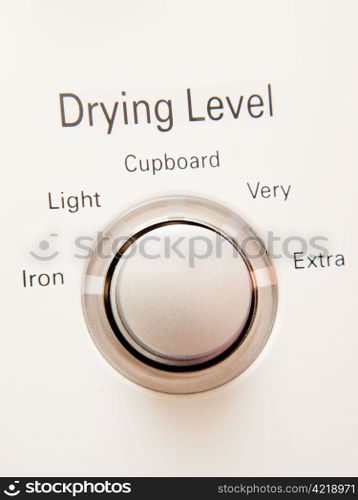 Program button. Program button with selections on a washing machine