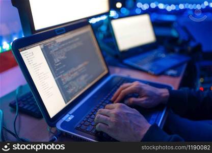 Programmer hands on laptop keyboard, computer technology. IT-manager at his workplace, professional coding and encryption, network security