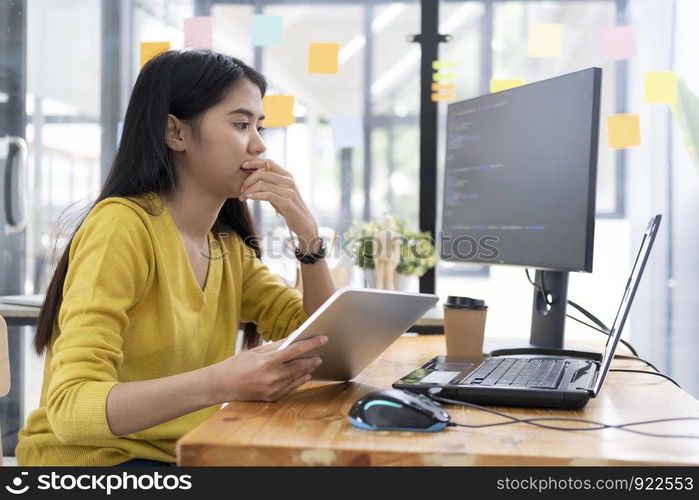 Programmers and developer teams are coding and developing software.