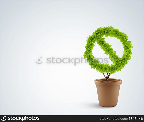 Prohibition symbol. Image of human hand cutting leaves of pot plant