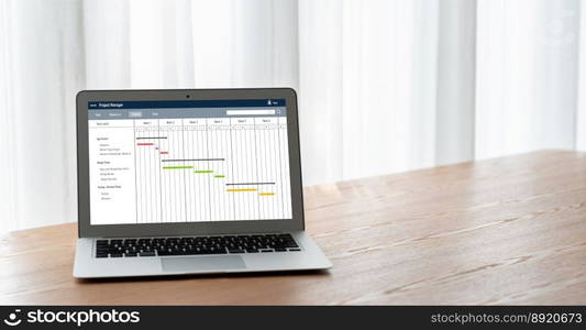 Project planning software for modish business project management on the computer screen showing timeline chart of the team project. Project planning software for modish business project management