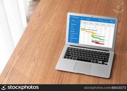 Project planning software for modish business project management on the computer screen showing timeline chart of the team project. Project planning software for modish business project management