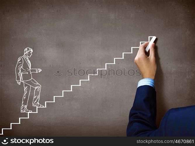 Promotion concept. Close up of human hand drawing career ladder with chalk
