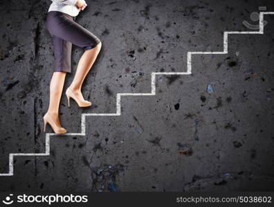 Promotion concept. Image of businesswoman climbing career ladder. Success and achievement