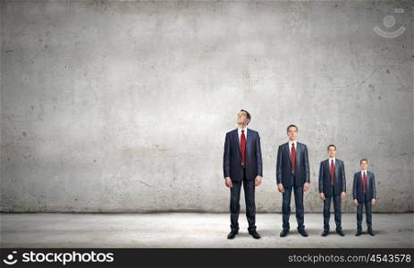 Promotion concept. Successful confident businessmen standing in line. Progress in career