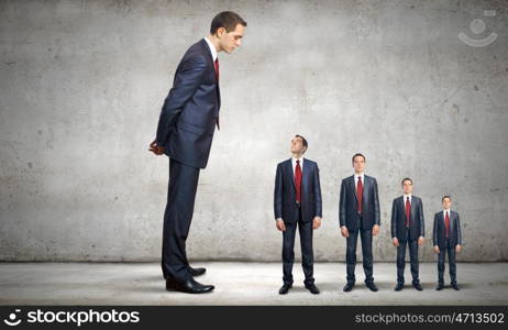 Promotion concept. Successful confident businessmen standing in line. Progress in career