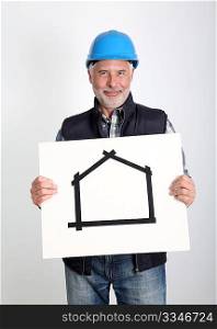Property developer showing house for sale sign