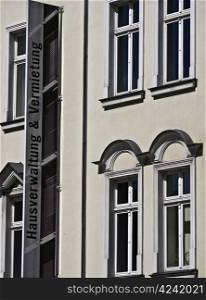 property management. Sign on a facade in Berlin for property management and renta