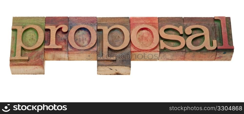 proposal word in vintage wooden letterpress printing blocks, stained by color inks, isolated on white