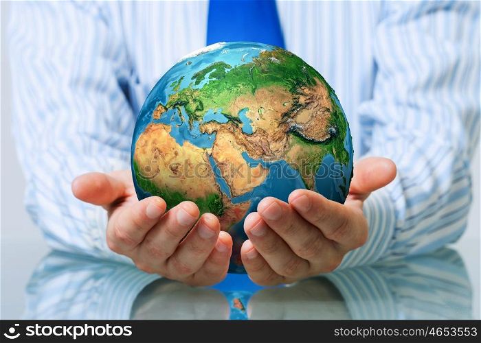 Protect life on Earth planet. Businessman hands holding Earth planet. Elements of this image are furnished by NASA