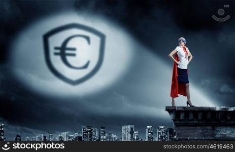 Protect your savings. Young woman super hero and euro sign in spotlight