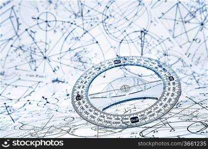Protractor on the background of mathematical formulas and algorithms