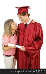 Proud mother congratulates her son on his graduation. Isolated on white.