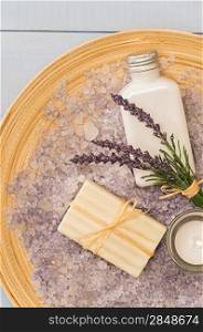 Provence style aromatherapy lavender cosmetic products on wooden tray