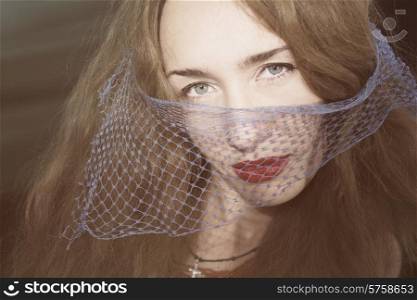 Prtrait of Young beautiful woman in the veil