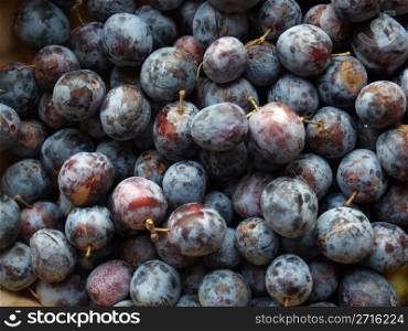 Prunes. Detail of prune fruits - healthy vegetarian food - useful as a background