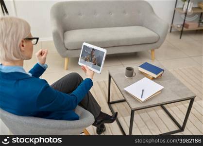 Psychologist give online consultation to military man. Woman holding digital tablet talk to soldier. Psychologist giving online consultation to military man