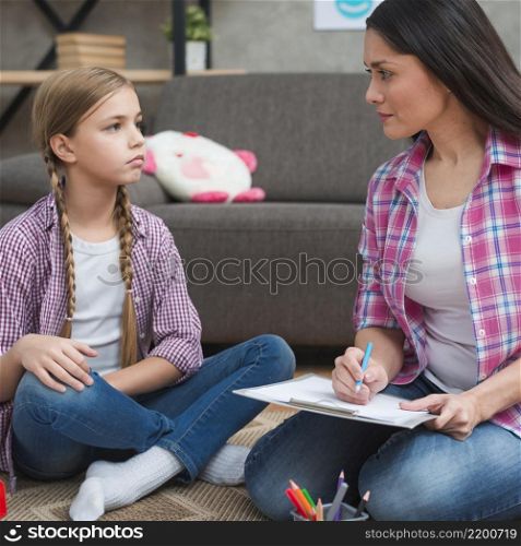 psychologist having session with her girl patient office