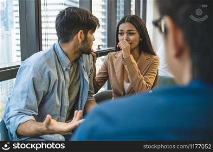 Psychotherapist inquiring about symptoms occurring within mind from couple patients with mental health problems. Group psychotherapy for support and helping worried man to change negative mindset
