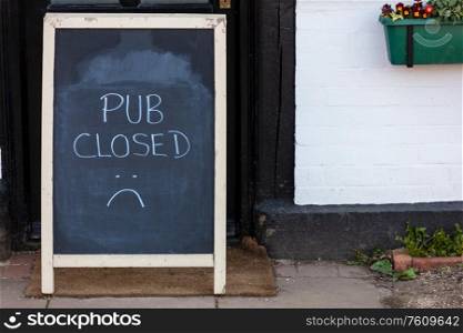 Pub Closed Blackboard or Chalkboard Sign Due to Coronavirus COVID-19 Pandemic