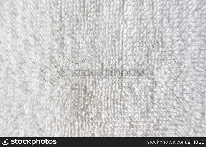 pubic hair fall on white towel