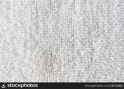 pubic hair fall on white towel