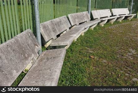 Public concrete bench. Concrete benches in a urban public park