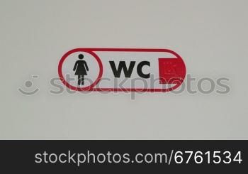 Public female toilet door sign