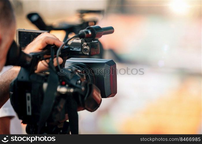 Public Live Event. Television cameras at a press conference outdoors