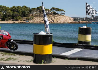 Public motorcycle track on the beach. In the background the sea.