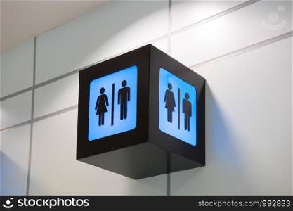 Public phone & toilet sign at the airport