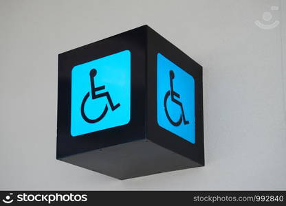 Public phone & toilet sign at the airport