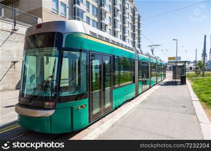 Public transport, modern tram in Helsinki in a beautiful summer day, Finland