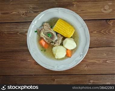 Puchero sopa - stew originally from Spain, prepared in Yucatan, Mexico, Argentina, Colombia, Paraguay, Uruguay. basic ingredients of the broth are meat , bacon, cured bones and vegetables
