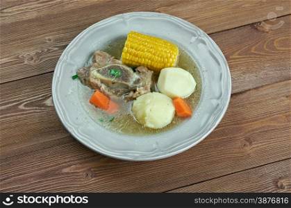 Puchero sopa - stew originally from Spain, prepared in Yucatan, Mexico, Argentina, Colombia, Paraguay, Uruguay. basic ingredients of the broth are meat , bacon, cured bones and vegetables