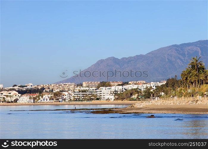 Puerto Banus skyline, resort town on Costa del Sol, waters of Mediterranean Sea, southern Spain, Malaga province.