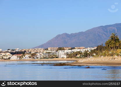 Puerto Banus skyline, resort town on Costa del Sol, waters of Mediterranean Sea, southern Spain, Malaga province.