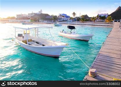 Puerto Morelos beach boats pier Mayan Riviera Mexico