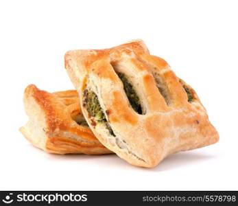 Puff pastry bun isolated on white background. Healthy patty with spinach.