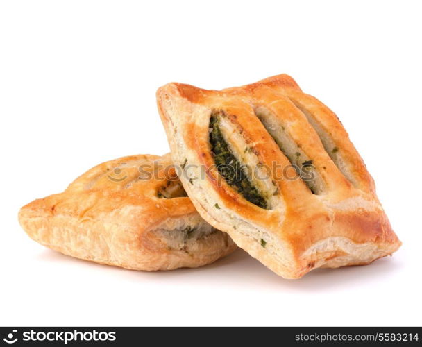 Puff pastry bun isolated on white background. Healthy patty with spinach.