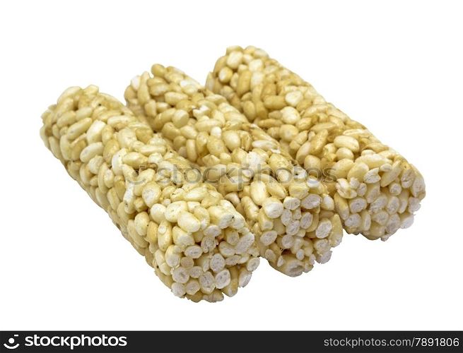 Puffed rice in honey on a white background