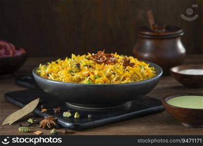 Pulao an Indian speciality, a dish made of rice with mint chutney