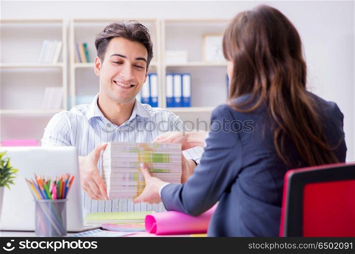 Pulisher discussing book order with customer. Publisher discussing book order with customer