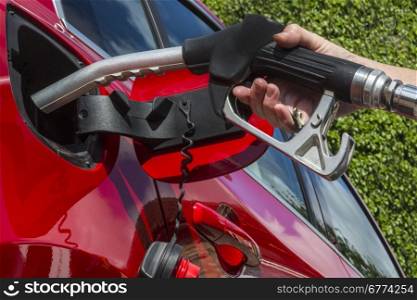 Pumping Gas - Filling a cars fuel tank with diesel.