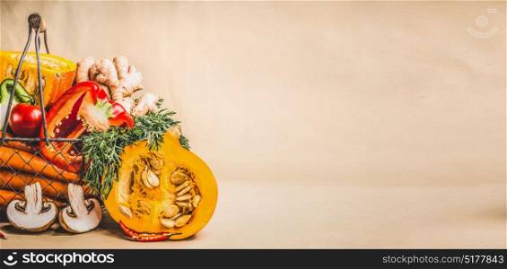 Pumpkin and organic seasonal vegetables for vegetarian and healthy cooking, front view, banner