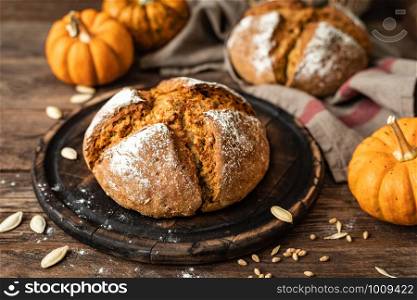 Pumpkin bread. Homemade wholemeal rye yeast-free bread with pumpkins